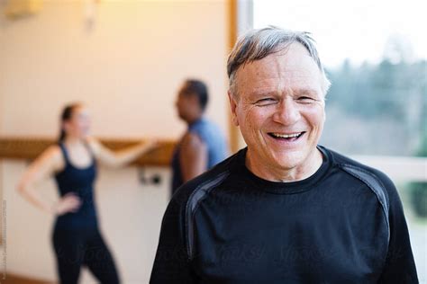 An Older Man In A Yoga Studio Class Del Colaborador De Stocksy Rob
