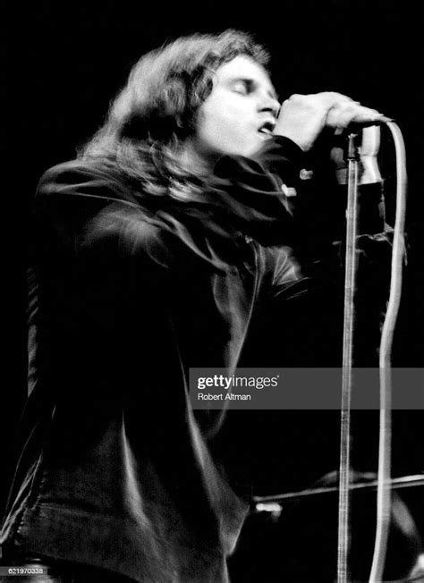 Lead Singer Jim Morrison Of The Doors Sings During A Performence At