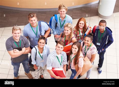 Overhead Portrait Of College Students Standing In Hallway Stock Photo