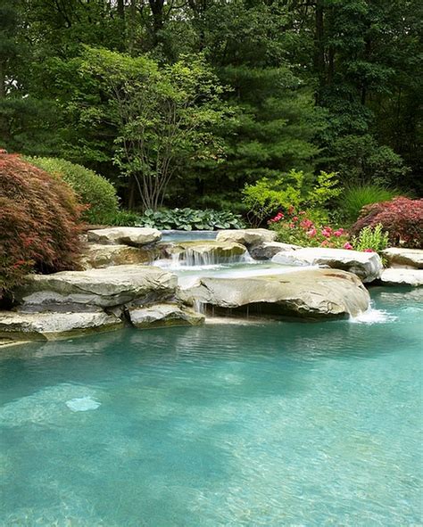 Charming And Spectacular Pool Waterfalls To Fashion Every Backyard Landscape