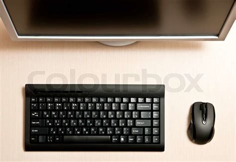 Black Keyboard Mouse And Monitor On A Wood Desk Stock Image Colourbox