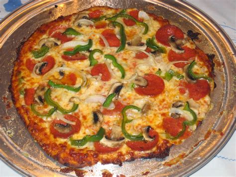 Pour in the water and mix well (by hand or with a wooden spoon or silicone spatula) until all the flour is hydrated. America's Test Kitchen: New York Thin Crust Pizza | Made ...
