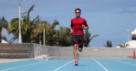 Sprinter Runner Athlete Man Sprinting Training On Athletics Track And