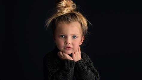 Cute Baby Girl In Black Background Is Wearing Black Knit Sweater 4k Hd