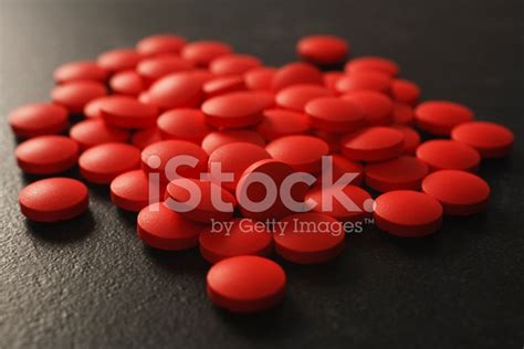Red Pills On Dark Background Stock Photos