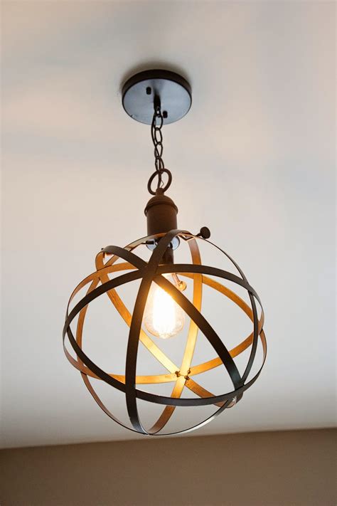 Try this diy for a pretty light fixture. 10 DIY Rustic-Industrial Light Fixtures | The Inspired Hive