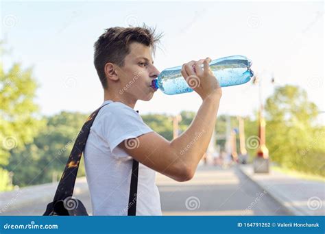 Teenager Boy Drinking Bottle Water Hot Summer Day Stock Photo Image