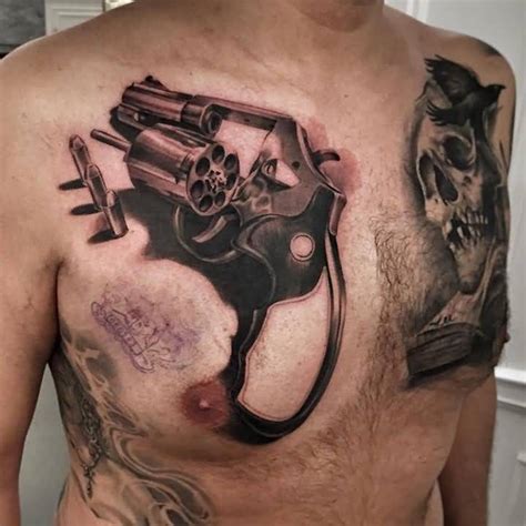 Would You Get These 13 Shooting Tattoos