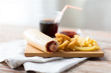 Close Up Of Fast Food Snacks And Drink On Table Stock Image Image Of