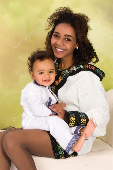 Ethiopian Mother With Baby Stock Photo By ©klanneke 43933171