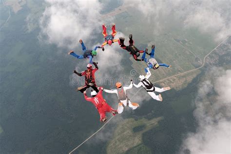 Formation Skydiving A Group Of Skydivers Are In The Sky Stock Image