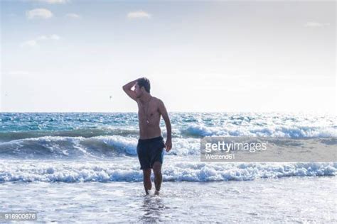 Man Coming Out Of Water Photos And Premium High Res Pictures Getty Images