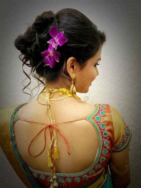 It was a very traditional indian bridal hairstyle with a beautiful long fishtail braid and a lot of mogras. South Indian Bridal Hairstyles For Wedding Reception ...