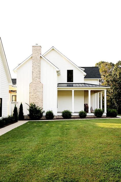 It also carries old designs showing in that earth tone along with the roof and chimney. Modern farmhouse Exterior Brick chimney Brick chimney ...