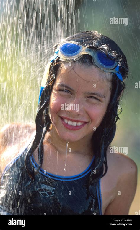 Girl Standing Under Shower Wearing Bikini Stock Photo Alamy