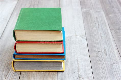 Four Books In The Colored Cover On The Table Stock Photo Image Of