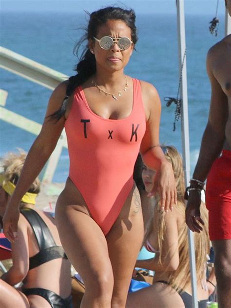 Christina Milian Steams Up The Beach In A Sexy One Piece Swimsuit