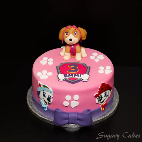 A Paw Patrol Themed Cake With Handmade Skye Figure On Top For A Small