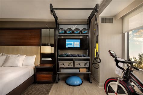 In Hiltons New Fitness Friendly Rooms You Can Literally Roll Out Of Bed And Into The Gym