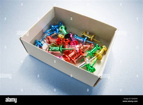 Push Pins In Paper Box Stock Photo Alamy