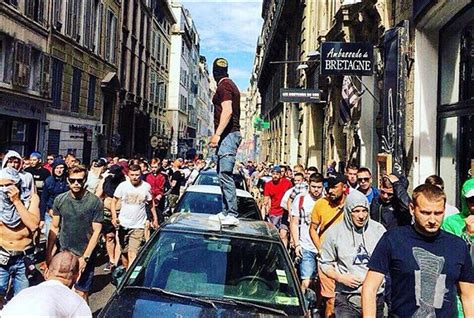 russian hooligans throwing chairs bottles and punches at english fans at euro 2016 daily mail