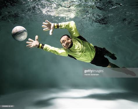 Young Man Underwater Playing Football High Res Stock Photo Getty Images