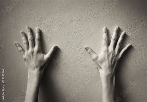 Hands Up Hands Against The Wall Concept Stock Photo And Royalty