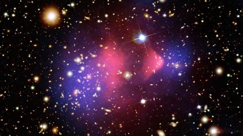 Galaxy Clusters Collide Dark Matter Still A Mystery