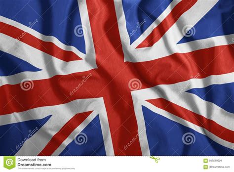 The British Flag Is Flying In The Wind Colorful National Flag Of