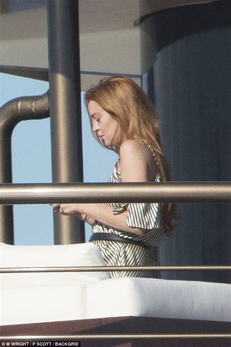 Lindsay Lohan Snaps Selfies On A Yacht In Cannes Daily Mail Online