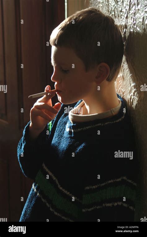Boy Smoking Stock Photo Alamy