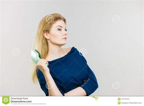 Woman Brushing Her Long Hair With Brush Stock Photo Image Of Girl