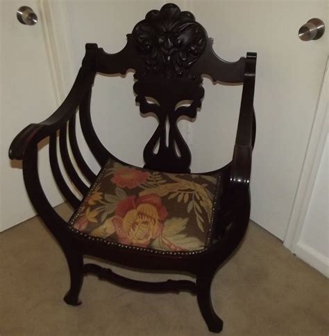 Antique northwind large oak rocking chair with carved face rocker early 1900 ' s photos and information in ancientpoint. Antique Carved Mahogany North Wind Face Curule Chair ...