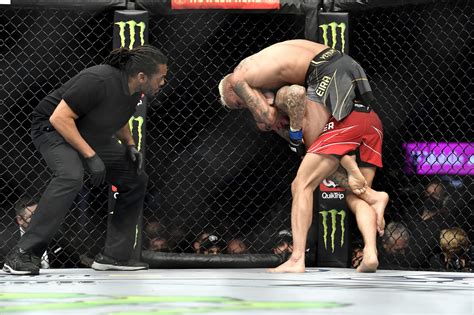 Charles Oliveira Finishes Dustin Poirier With Standing Rear Naked Choke To Retain Lightweight