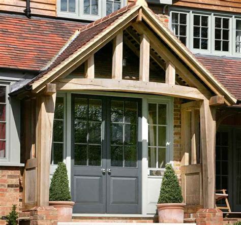 If you don't want to empty your bank account but are still eager to enhance the look of your house in the uk, one good way is to build a. contemporary grey porch oak door uk - Google Search ...