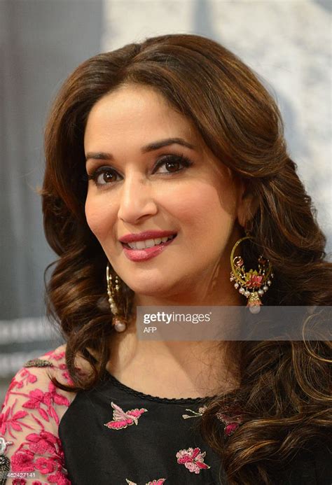 Indian Bollywood Actress Madhuri Dixit Looks On During A Promotional