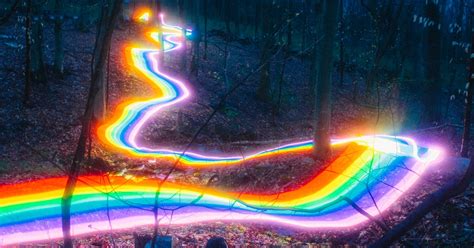 Long Exposure Photography Of Rainbow Road Illuminated Landscapes