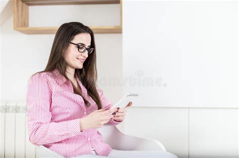Oxygen bunnies hand out bottles of fresh air as part of a promotion in china. Executive Sitting On A Chair Browsing A Tablet Stock Image ...