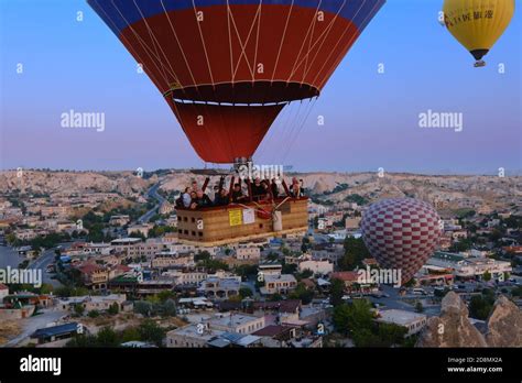Tourists In Hot Air Balloon Fly Close In Cappadocia Turkey Stock Photo