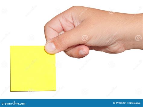 Hand Holding A Yellow Sticker Post It Note Stock Image Image