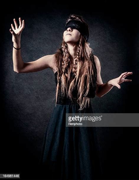 girl wearing blindfold photos and premium high res pictures getty images