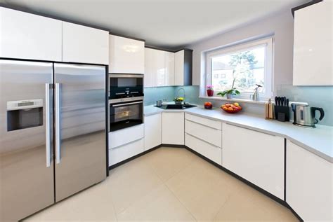 Contemporary kitchen high gloss acrylic white cabinets with. Modern kitchen with High Gloss cabinets and a Glass ...