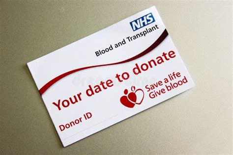 Nhs Blood And Transplant Donor Card On A Grey Background Editorial