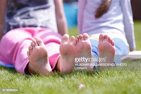 Girls Bare Feet On Grass Photo Getty Images
