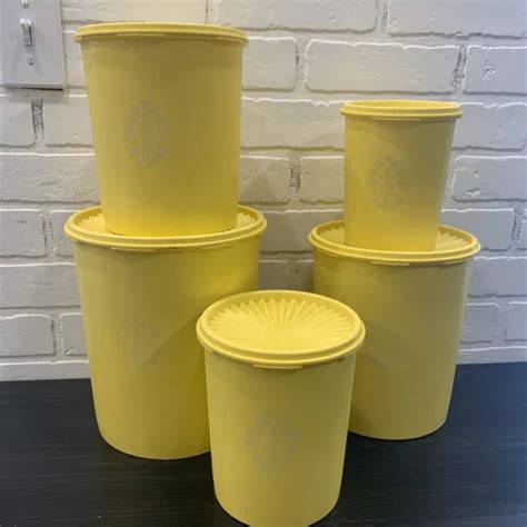 Vintage Tupperware Yellow Servalier Nesting Canister Set Of W Lids