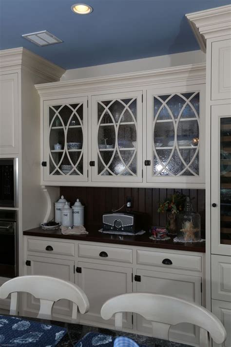 Let dry and see if you need another i'm thinking of painting my kitchen cabinets and i'm curious if you painted over your hinges? White Painted Hutch Cabinetry with Curved Mullions and ...