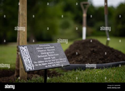 A plaque with names remembering children who lost their lives before