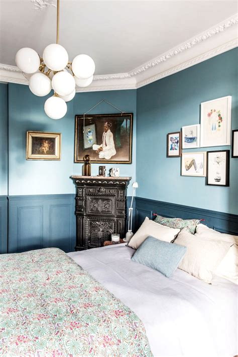 The wyatt bed is from room & board. Moody blue masculine bedroom - Interiors By Color