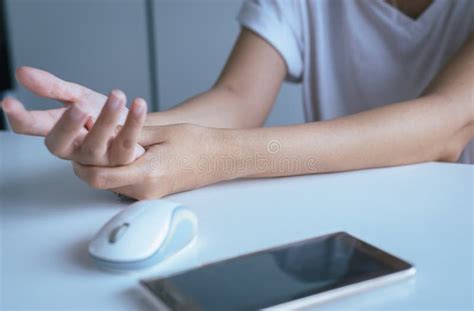 Young Asian Woman Having A Wrist Or Hand Painfemale Feeling Exhausted