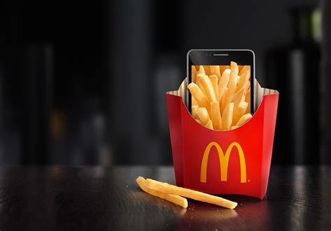 The mcdonald's mobile app uses deals to entice and mobile ordering to fulfill. McDonald's Mobile App on Behance